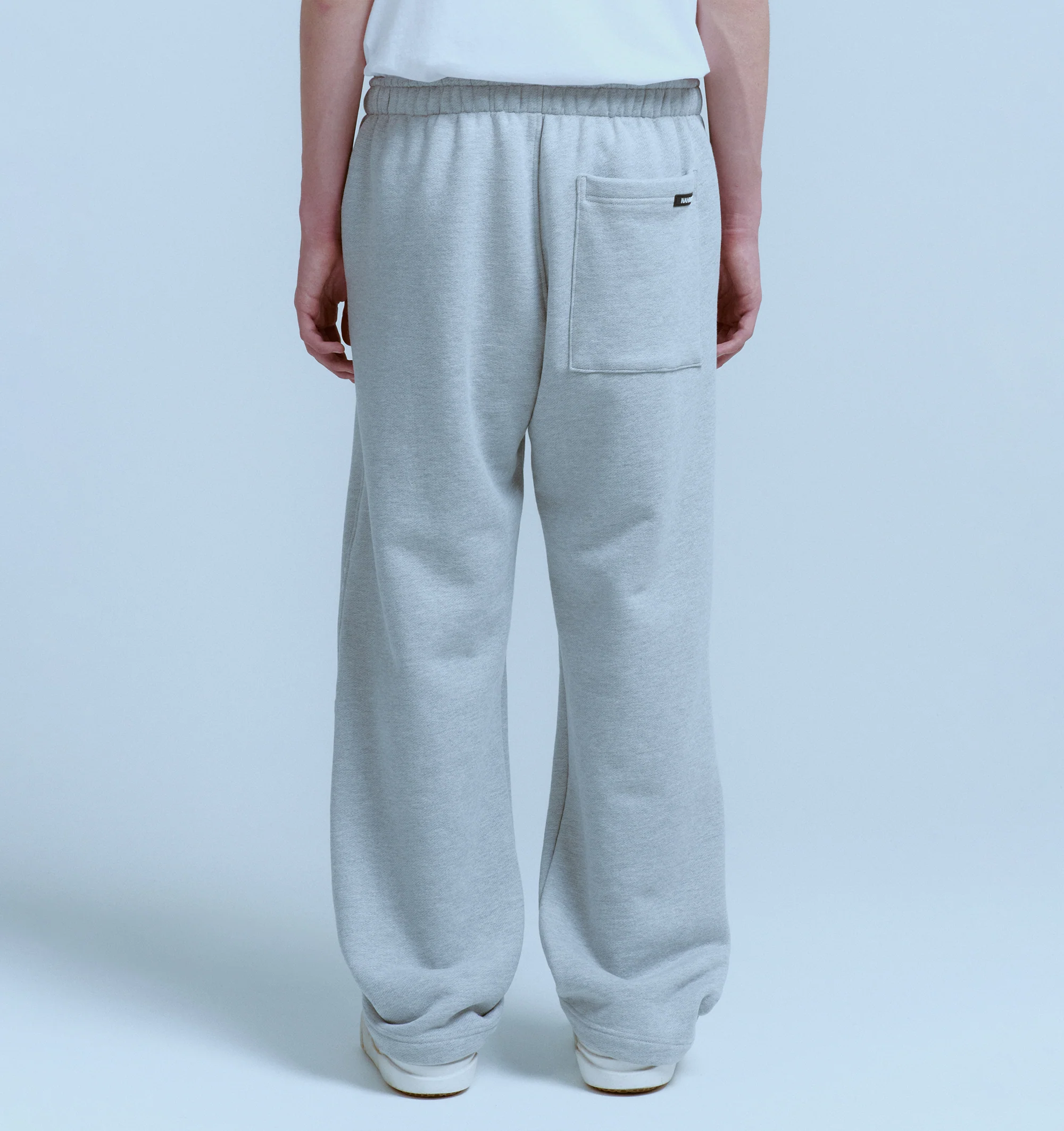 Image 4 of 6 - GREY - NAHMIAS Youth Enrichment Wide Sweatpant featuring elastic waist with drawstring, wide leg, relaxed fit, side pockets, back patch pocket and elastic hem. 100% cotton.