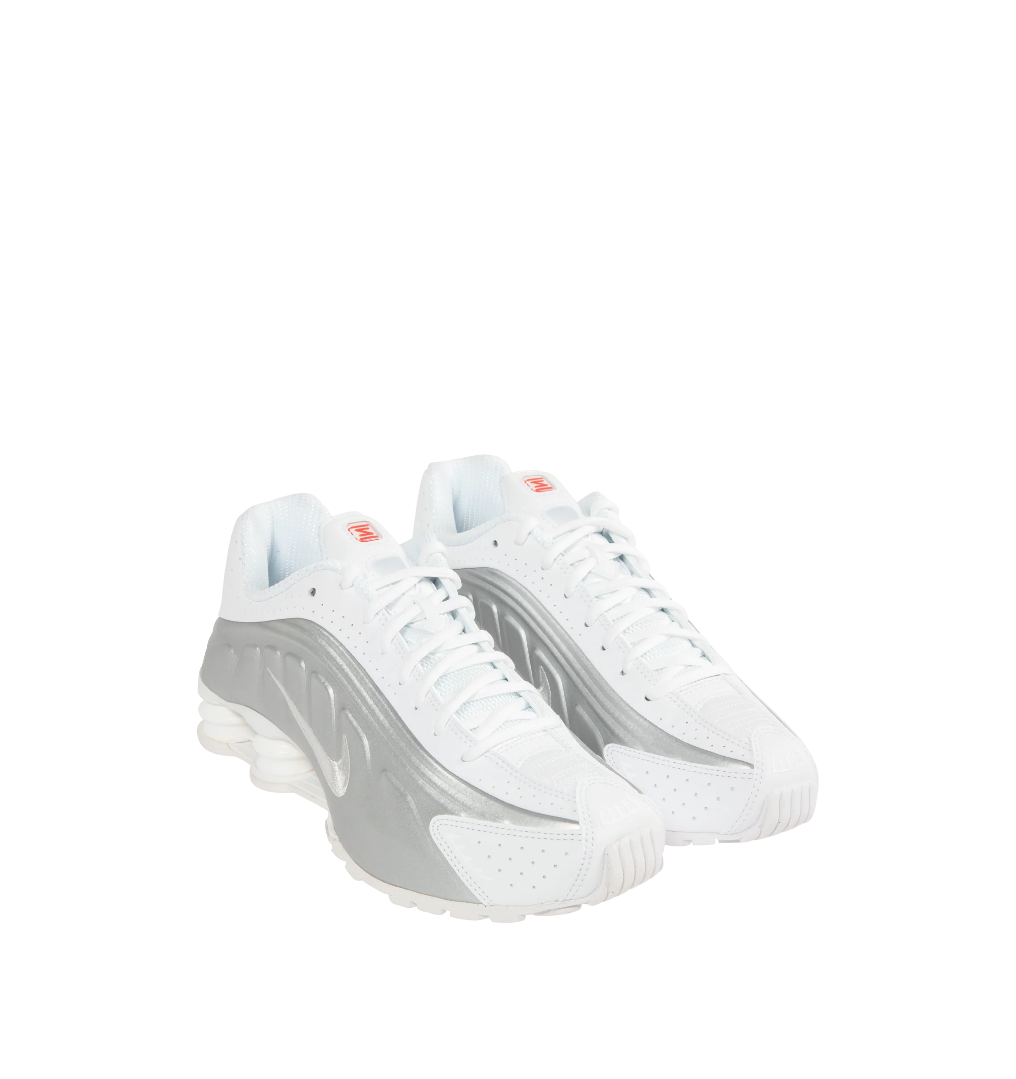 Image 2 of 5 - WHITE - Nike Womens Shox Magia Sneakers feature a premium leather and textile upper. Designed with a lace-up closure, metallic accents, Total 90-inspired detailing, Nike Shox cushioning columns, and durable rubber outsole. Upper: Leather and Textile; Cushioning: Nike Shox; Outsole: Rubber. Imported 