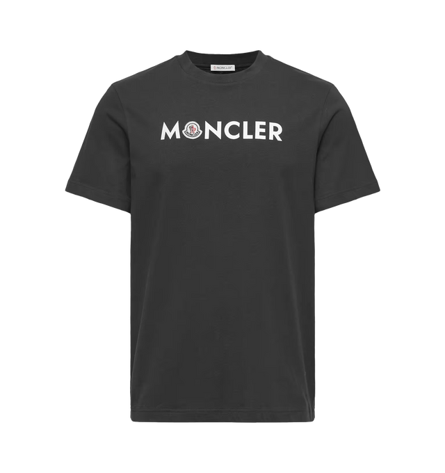 Image 1 of 1 - BLACK - Moncler Mens Logo Cotton T-Shirt is crafted from cotton jersey. Features a regular fit, crew neck, short sleeves, logo print, and logo patch. Base Fabric: 100% Cotton; Collar Rib: 100% Cotton. Made in Turkey.