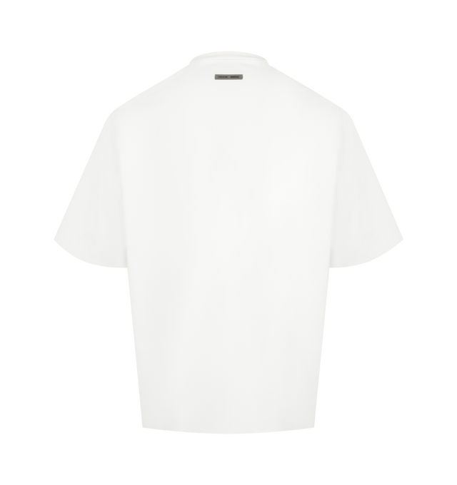 Image 2 of 2 - WHITE - Fear of God Essentials 90s Tee is cut from Ponte jersey, offering a soft feel with spandex for stretch comfort. Designed in an oversized 90s-inspired silhouette, it features exaggerated proportions with dropped shoulders for a relaxed drape. The front is defined by a metallic 3M print application of the Fear of God Essentials lockup. The signature rubberized Fear of God Essentials label at the collar. Fit Note: Size Medium fits like Classic Tee XL in this oversize style. 54% recycled