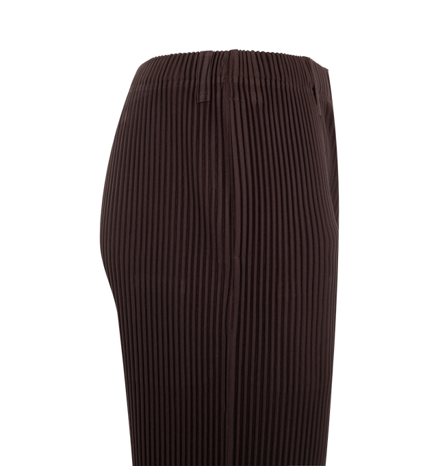 Image 3 of 3 - BROWN - ISSEY MIYAKE Pant featuring portability and lightweight comfort, quick-drying properties, shorter length, pockets on both sides, a drawstring waist and pleated thoughout. 100% polyester. Made in Japan.  