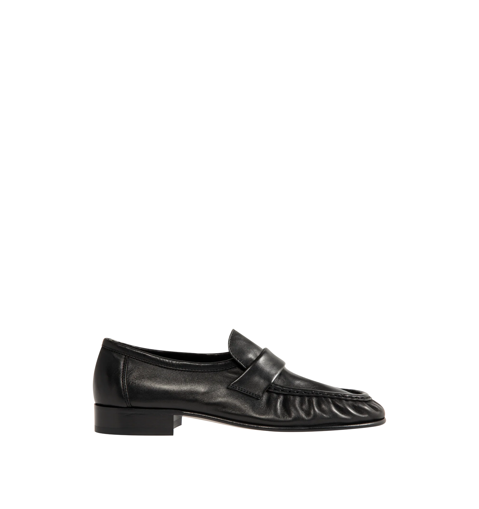 Image 1 of 4 - BLACK - The Row womne's artisanally-crafted loafer in soft nappa leather with natural pleating effect and hand-painted leather sole. 0.75 in. heel. 100% Lambskin Leather. Made in Italy. 