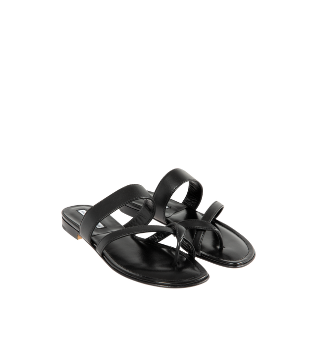 Image 2 of 4 - BLACK - MANOLO BLAHNIK Susa Leather Crossover Flat Sandals featuring nappa leather open toe sandals with crossover straps and flat stacked heel. Upper: 100% lamb nappa. Sole: 100% calf leather. Lining: 100% kid leather. Heel measures 10 mm. Made in Italy. 