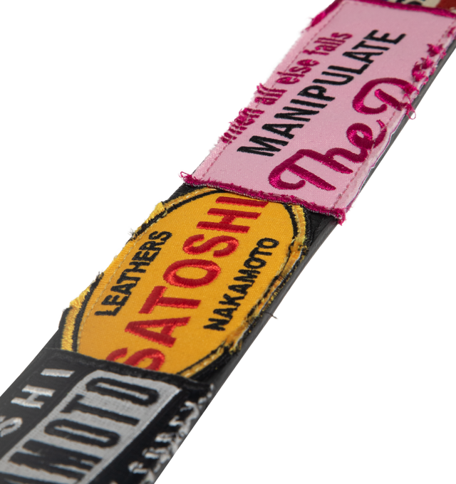 Image 3 of 3 - MULTI - SATOSHI NAKAMOTO Codex Patch Belt featuring a vibrant patchwork design and a large peace sign buckle. 100% leather.