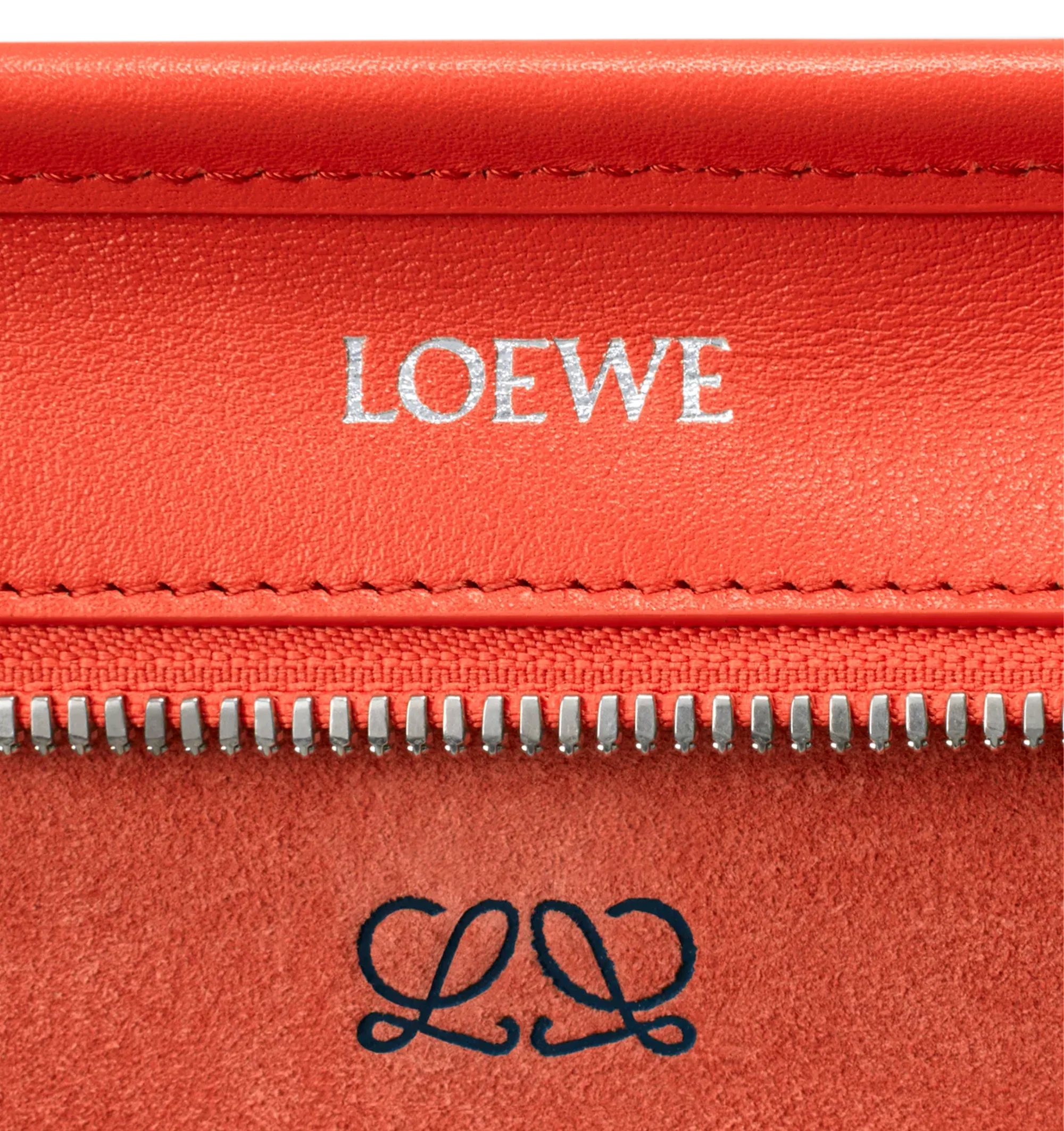 Image 15 of 17 - ORANGE - Loewe Small Amazona 180 Bag in leather features a relaxed silhouette anchored by a single toron top handle, designed to be carried open, while a concealed closure secures the main compartment, three carry options: short handle, removable shoulder strap and crossbody, zip closure with two leather zip pullers, two compartments, main compartment closed with magnetic closure, internal flat pocket, left side d-ring for customization, nappa lambskin lining, and embossed double L branding 
