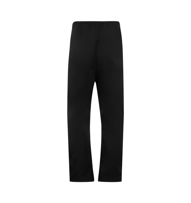 Image 2 of 4 - BLACK - FEAR OF GOD ESSENTIALS Active Trace Relaxed Drawstring Pant featuring drawstring waistband, side seam pockets, rubberized logo patch and midweight ripstop fabric. 100% nylon.